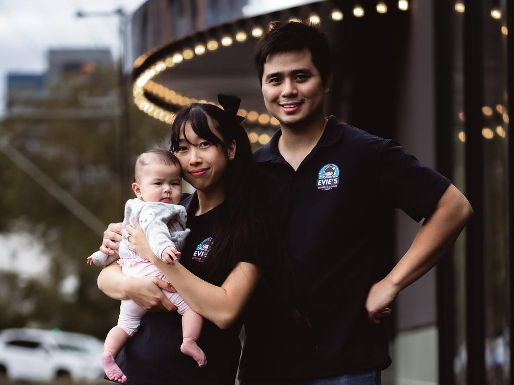 Owners Lin Gau and David Hoang with baby Evie. Picture: GK Productions