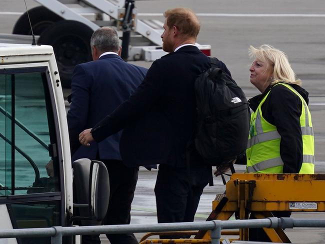 Prince Harry was seen boarding a flight at Aberdeen Airport to return to London yesterday. Picture: Peter Summers/Getty Images