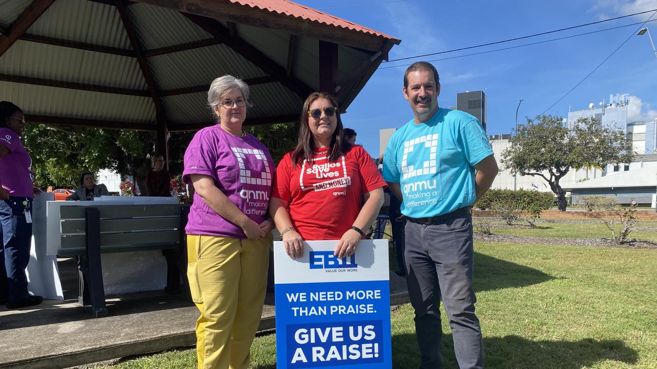 Nurses Faye Tomlin and Stacey Styles with QNMU organiser Grant Burton.