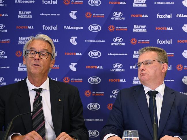 (L-R) FFA CEO David Gallop, Chairman Chris Nikou and Head of Leagues Greg O'Rourke address media in Sydney, Thursday, December 13, 2018. The A-League will expand to 12 teams in the next two seasons after FFA decided to award licences to new teams based in Western Melbourne and South West Sydney. (AAP Image/Dan Himbrechts) NO ARCHIVING