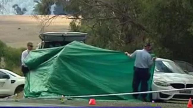 Police at the scene where the body of former bikie Ciano's body was found in his car near Oberon.