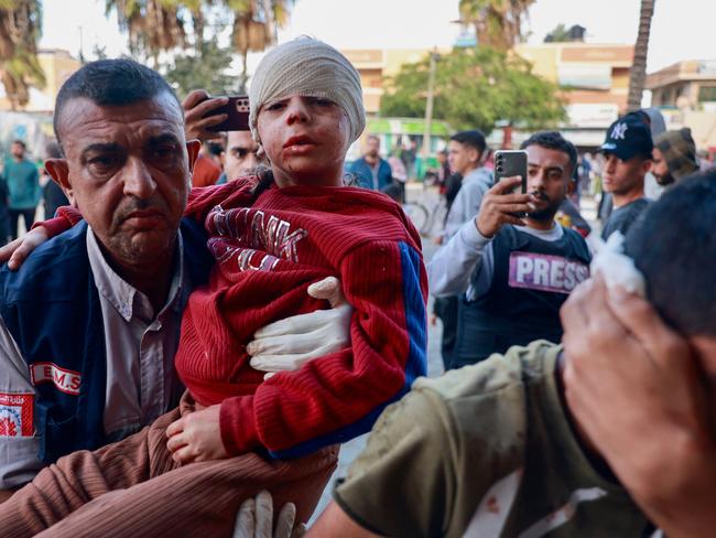 Palestinian medics transport injured youths to the Al-Aqsa Martyrs Hospital in Deir Balah in the central Gaza Strip. Picture: AFP