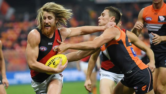 Dyson Heppell palms off Josh Kelly.