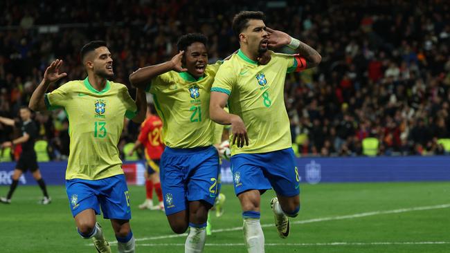 Paqueta (right) is a decorated Brazilian international. (Photo by Pierre-Philippe MARCOU / AFP)