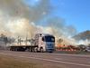 WATCH: Bruce Highway cut by blaze as fireys defend properties