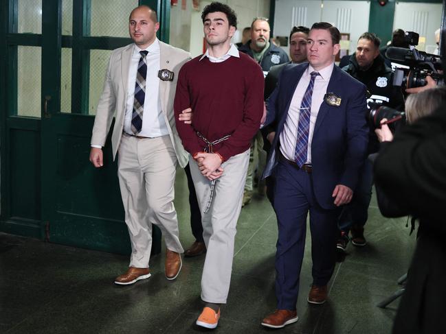 Luigi Nicholas Mangione (C) arrives at Manhattan Criminal Court in New York on December 23, 2024. Mangione, 26, is accused of shooting UnitedHealthcare chief executive Brian Thompson. Picture: AFP