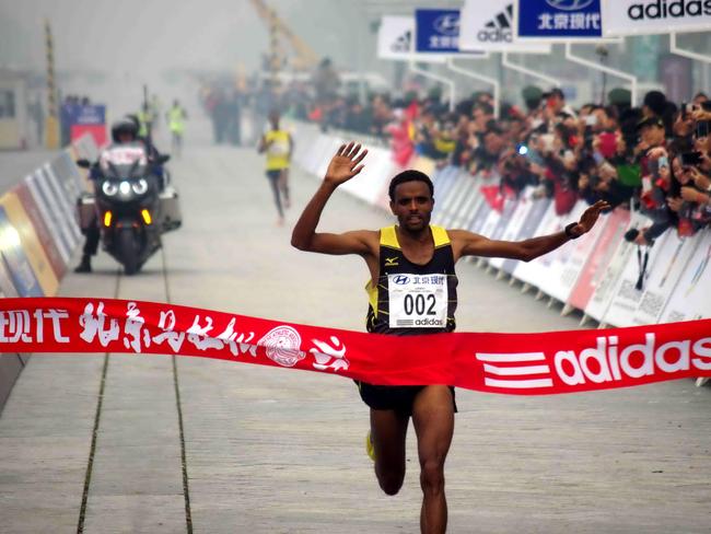 Beijing Marathon Runners Don Face Masks To Battle Smog Au — Australias Leading News Site 4622