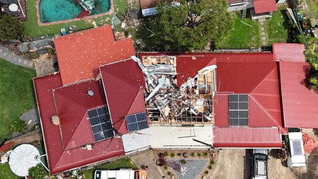 Storm recovery at Oxenford. Adam Baileys house on California Drive lost its roof. Picture Glenn Hampson