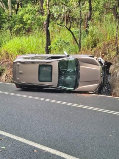 A 4wd rolled after hitting an embankment, causing traffic delays on the Captain Cook Highway between Cairns and Port Douglas. Picture: Supplied