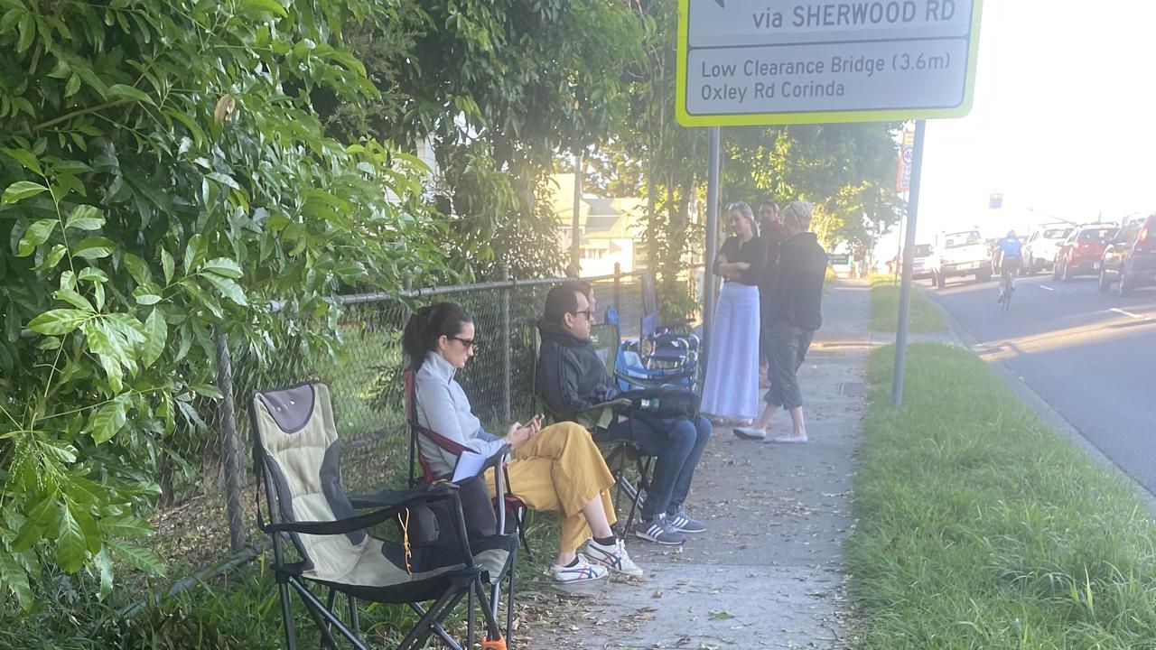 Parents queue outside Sherwood State School on Tuesday, April 19. Picture: Kayla Mclean