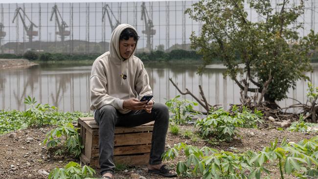 A worker, Atta outside his house in Labota Village, Morowali, Central Sulawesi, Indonesia. Picture: Garry Lotulung