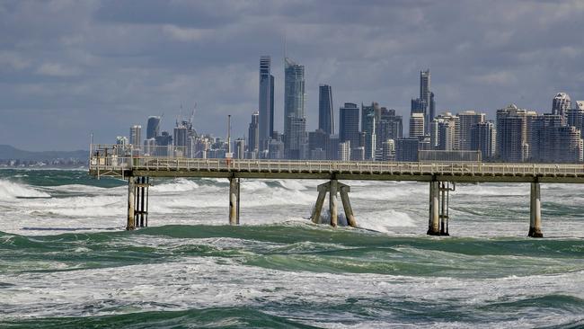 Strong wind and larger than normal seas with Surfers Paradise skyline in the background. Photo: Jerad Williams