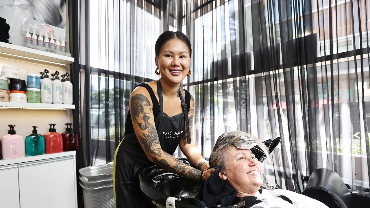 Salon Manager Winter Ham with client Kayleen Morgan at Epic Hair in Fortitude Valley. Picture: Tara Croser