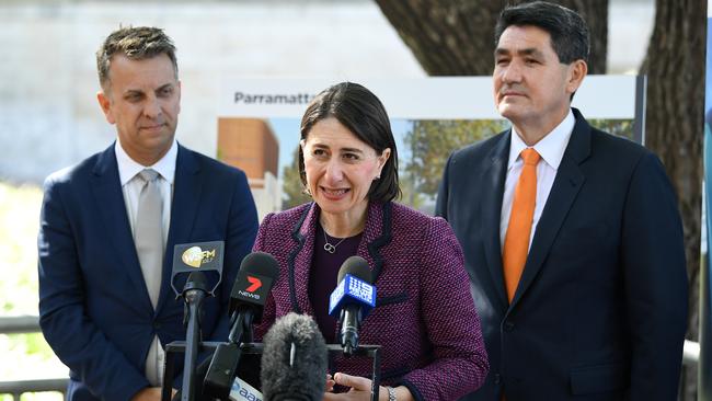 Andrew Constance, NSW Premier Gladys Berejiklian and Geoff Lee at yesterday’s Metro announcement. Picture: AAP