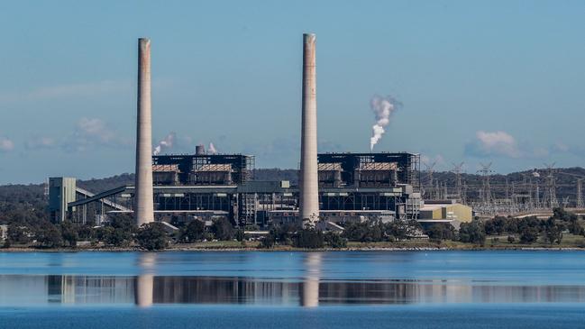 MUSWELLBROOK, AUSTRALIA - APRIL 15: Liddell Power Station  as seen from Lake Liddell on April 15, 2023 in Muswellbrook, Australia. Australia has pledged to cut carbon emissions by 43% from 2005 levels by 2030, up from the previous conservative government's target of between 26% and 28%, the BBC reported. Australia is one of the world's highest per capita carbon emitters, and reaching its targets will require a pivot away from fossil fuels and substantial investment in renewables. (Photo by Roni Bintang/Getty Images)