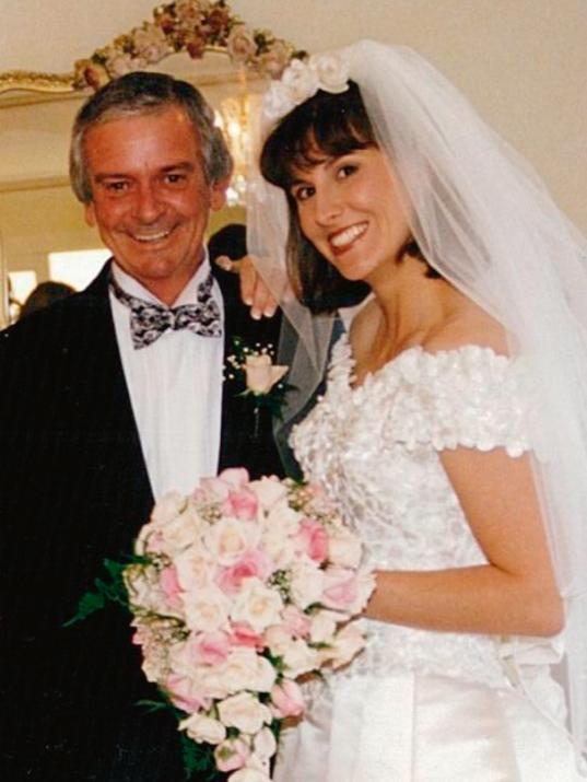 With her beloved father Jim at her 1995 wedding.