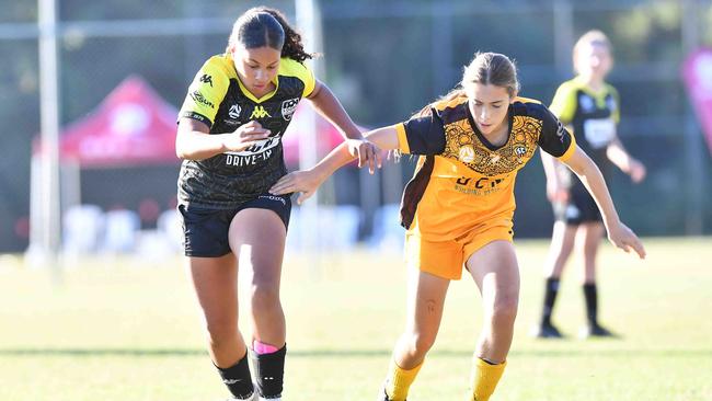 SOCCER: Junior football carnival, Maroochydore. Sunshine Coast Wanderers V Logan Lighting Maroon, junior girls. Picture: Patrick Woods.