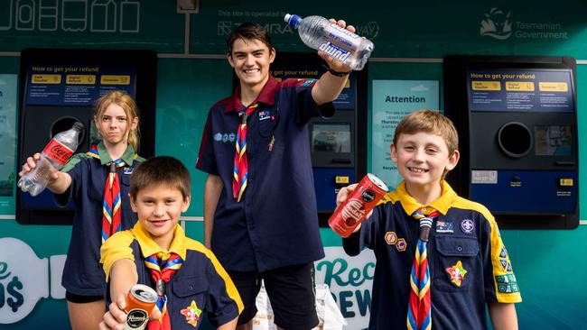 Scouts Tasmania members Jasmine Harper, Phoenix McCarthy, Xavier Webster, Vincent Webster at the official start of the Recycle Rewards container refund program at the Resource Work Cooperative at South Hobart Tip Shop. Picture: Alastair Bett