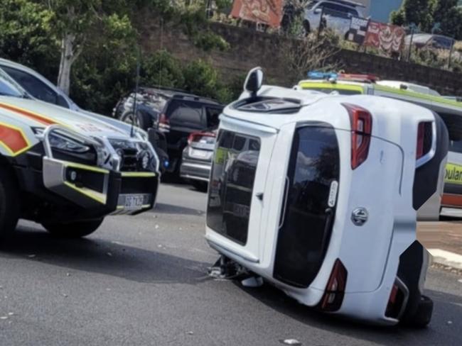 A car was left on its side after a crash at Boat Harbour Drive in Hervey Bay.