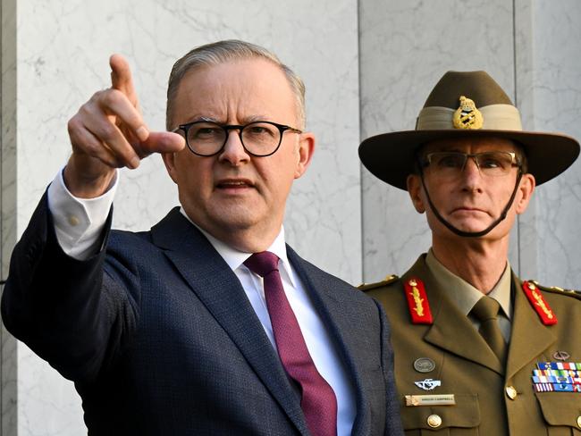 Australian Prime Minister Anthony Albanese and Chief of the Australian Defence Force (ADF) Angus Campbell speak to the media duing a press conference after the release of the Defence Strategic Review at Parliament House in Canberra, Monday, April 24, 2023. (AAP Image/Lukas Coch) NO ARCHIVING