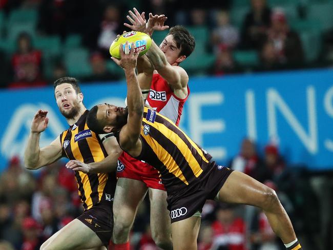 Hawthorn defender Josh Gibson takes a strong mark. Picture. Phil Hillyard