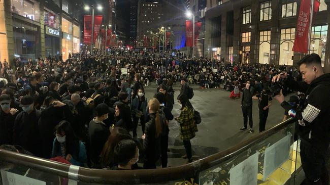 Hongkongers angry after a girl was shot in the eye and are protesting in Martin Place against the crackdown of their rights in their home country. Picture: Campbell Gellie