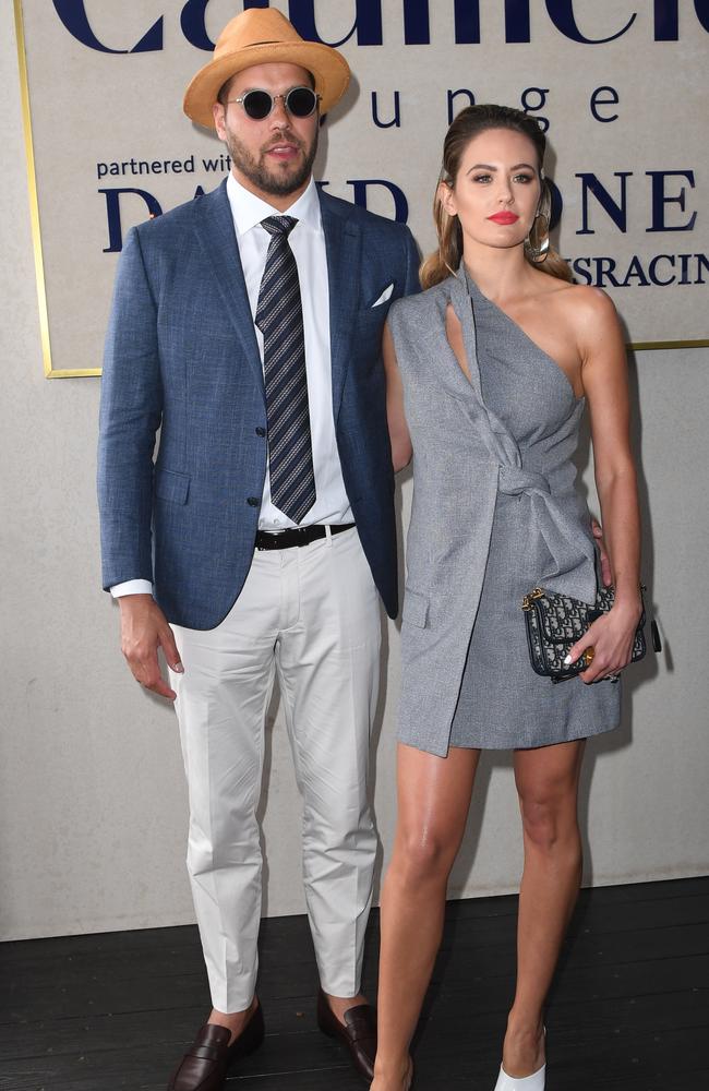 Lance and Jesinta Franklin pose for photos in the David Jones marquee on Caulfield Cup Day. Picture: Julian Smith, AAP Image