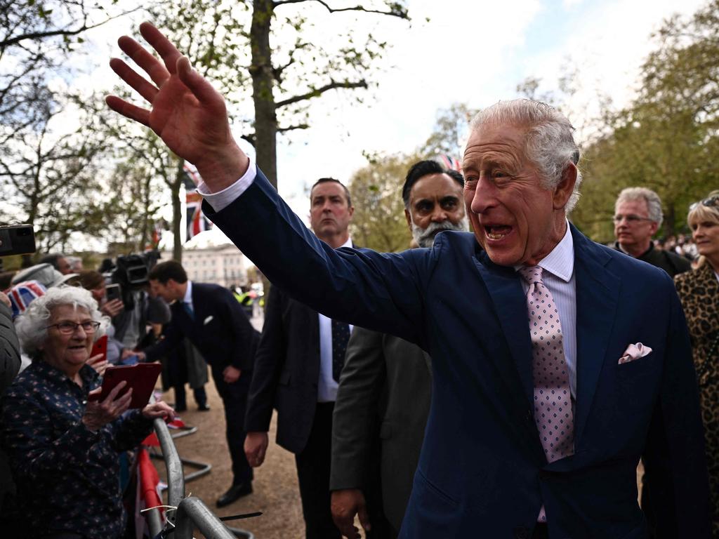 Britain's King Charles III waves to well-wishers on The Mall near to Buckingham Palace in central London. Picture: AFP