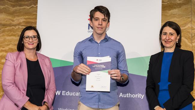 Isaac Davis from Conservatorium High School with Minister for Education Sarah Mitchell and Premier Gladys Berejiklian at yesterday’s First in Course Awards at UNSW. Picture: NSW Education Standards Authority Flickr