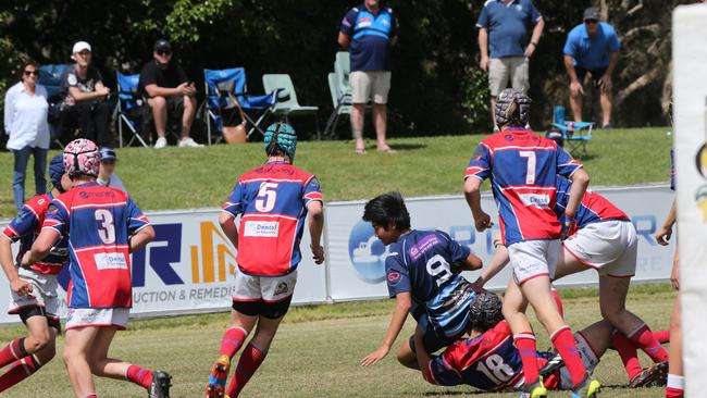Action galleries of the junior rugby union grand finals, match played at Surfers Paradise Home Ground. Helensvale Hogs Vs Bond Uni Pirates under 14s division. Helensvale Player Kobi Nouanrfasy. Picture Mike Batterham