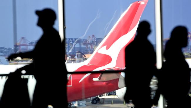 SYDNEY, AUSTRALIA - NewsWire Photos JULY 29, 2022: General scenes of a Qantas plane at the arrival gate at SydneyÃs International AirportPicture: NCA NewsWire / Jeremy Piper