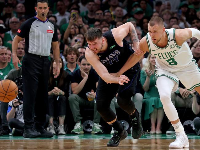 Doncic one-on-one with Kristaps Porzingis. Picture: Matt Stone/MediaNews Group/Boston Herald via Getty Images