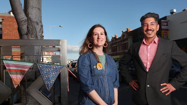 Briony Alderslade of Frangipani Fabrics and Amandeep Handa of Culinary Kings who are both happy parking meters have been suspended on the North Hobart Elizabeth Street strip. Picture: Nikki Davis-Jones