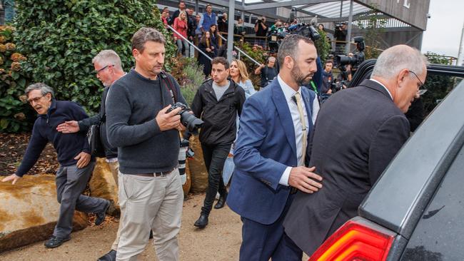 Scott Morrison being rushed into a car by his security detail during the Federal election campaign earlier this year. Picture: Jason Edwards