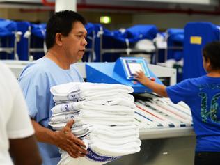 Royal Darwin Hospital staff members prepare the clean towels and laundry to be transported to the Hospital.