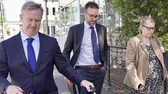 Pets Galore manager Nicole Louise Bourne leaves the Toowoomba Courthouse with her barrister Jens Streit (left) and solicitor Harrison Humphries.