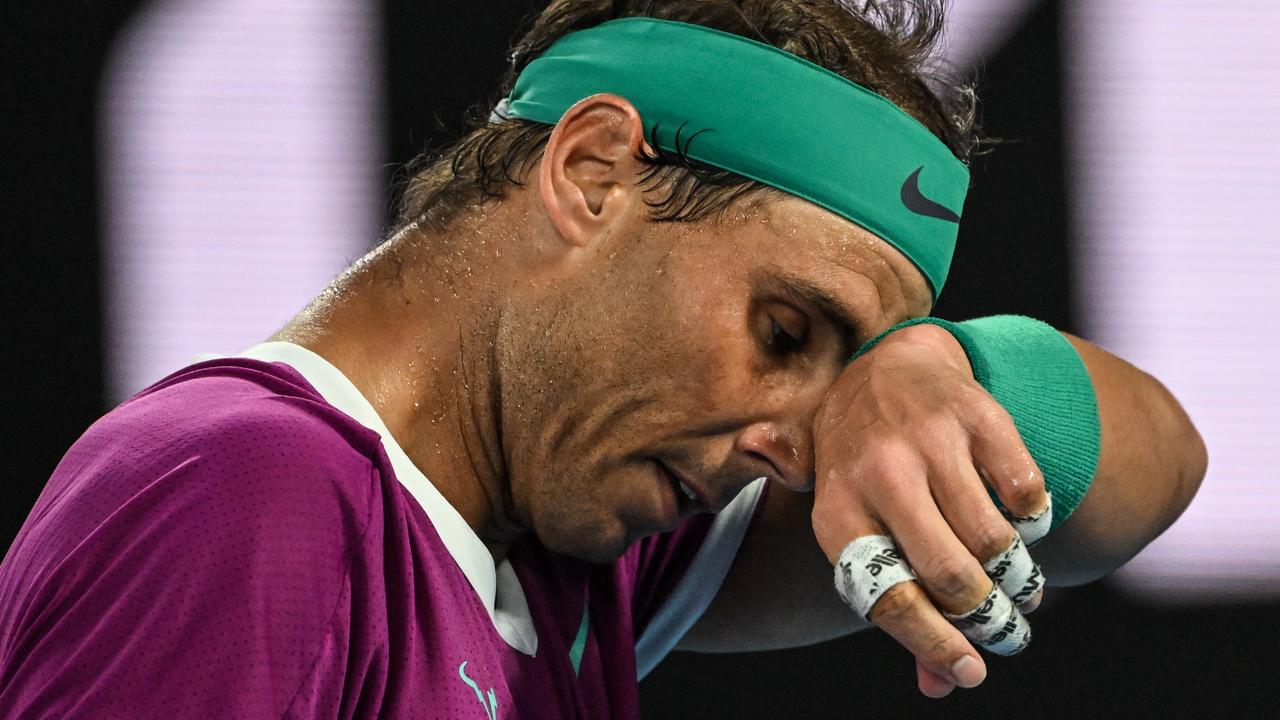 Rafael Nadal’s sweaty fingers were covered in bandaids. Photo by TPN/Getty Images