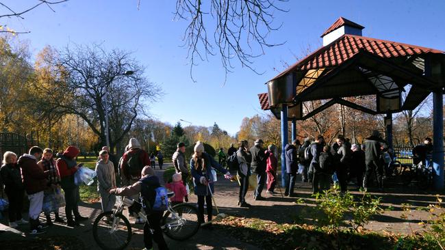 Kyiv residents queue to collect water in plastic containers and bottles at one of the parks in the Ukrainian capital Kyiv. Picture: AFP