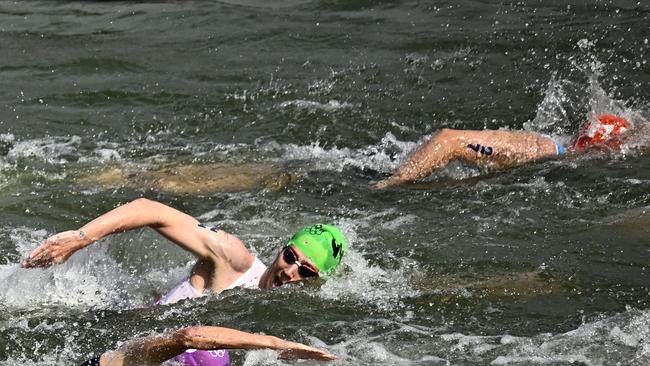 Athletes complained of the water quality in the river that runs through Paris. (Photo by JULIEN DE ROSA / AFP)