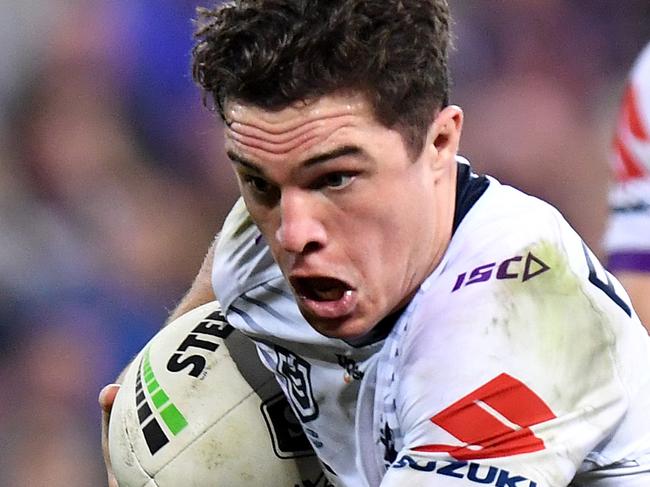 BRISBANE, AUSTRALIA - AUGUST 02: Brodie Croft of the Storm breaks away from the defence during the round 20 NRL match between the Brisbane Broncos and the Melbourne Storm at Suncorp Stadium on August 02, 2019 in Brisbane, Australia. (Photo by Bradley Kanaris/Getty Images)