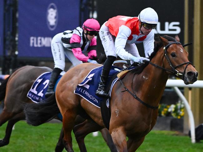 MELBOURNE, AUSTRALIA - JULY 15: Thomas Stockdale riding Najem Suhail winning Race 9, the Trevor Clarke Handicap, during Melbourne Racing at Flemington Racecourse on July 15, 2023 in Melbourne, Australia. (Photo by Vince Caligiuri/Getty Images)