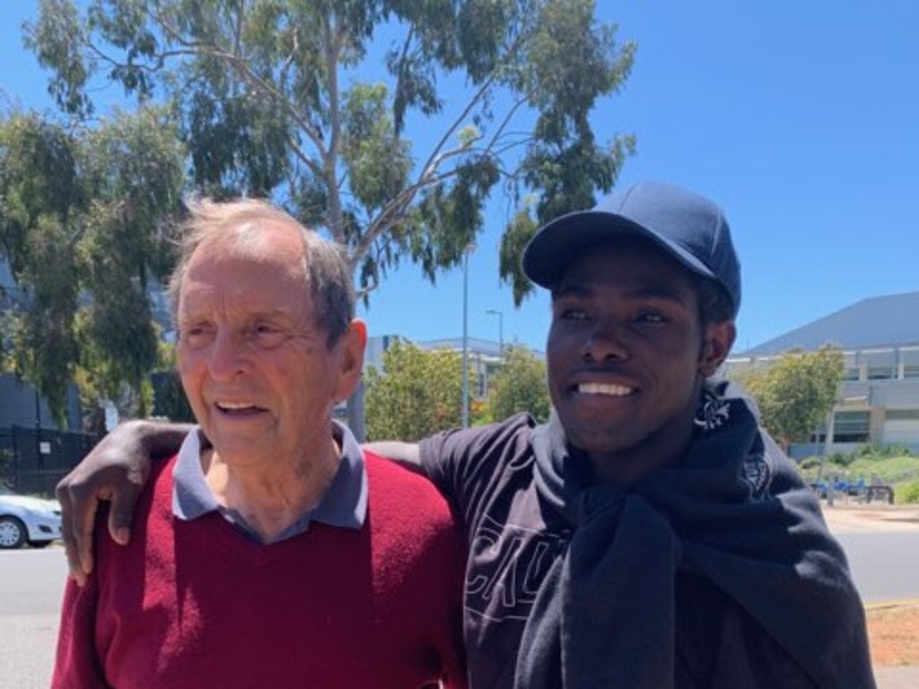 Fred Zziwa with his adoptive grandfather Alan, who first took him to a boxing gym.