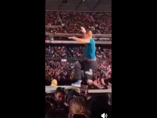 Chris Martin falls through stage at Melbourne concert