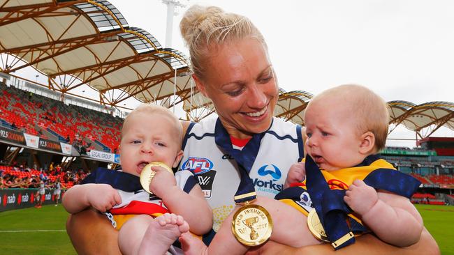 Erin Phillips of the Crows celebrates with her twins Blake and Brooklyn after the AFL Women's Grand Final on March 25, 2017. Picture: Jason O'Brien/Getty Images