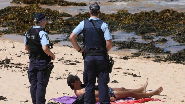 NSW police officers on patrol at Dee Why Beach on Sydney's northern beaches. Picture: NCA NewsWire / Damian Shaw