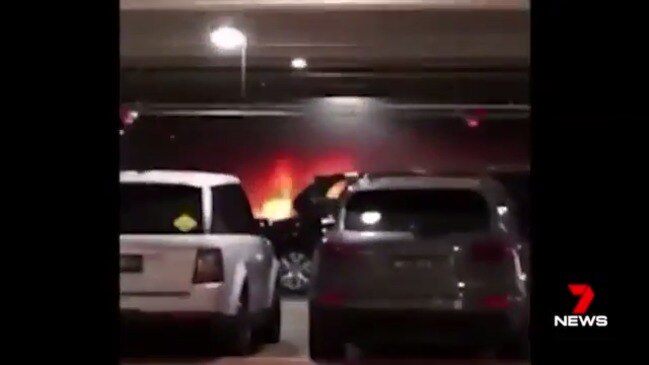 Car on fire in the underground car park of Chadstone Shopping Centre (7 News Melbourne)