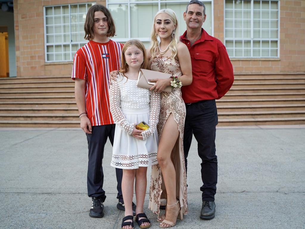 Natalia Gibbs (centre) with brother Nicholas, sister Michaela and dad Chris at the Mackay North State High School formal at Windmill Function Centre, November 19, 2021. Picture: Heidi Petith