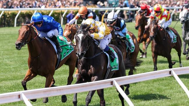 Aethelflaed (orange cap) emerged as an Oak contender with a big run in the Wakeful Stakes, won by Amazonian Lass (yellow silks). Picture: George Sal/Racing Photos via Getty Images