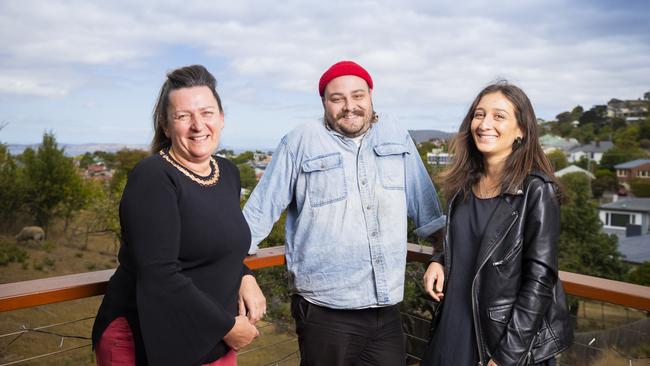 Author Madeleine Rojahn, right, with graphic designer/photographer Joshua Quigley and former refugee Jelena Djekanovic. Madeleine is working on a book about refugees in Tasmania. Picture: RICHARD JUPE