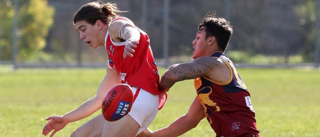 Therry Penola and Preston Bullants clash during the VAFA Division 1 campaign.